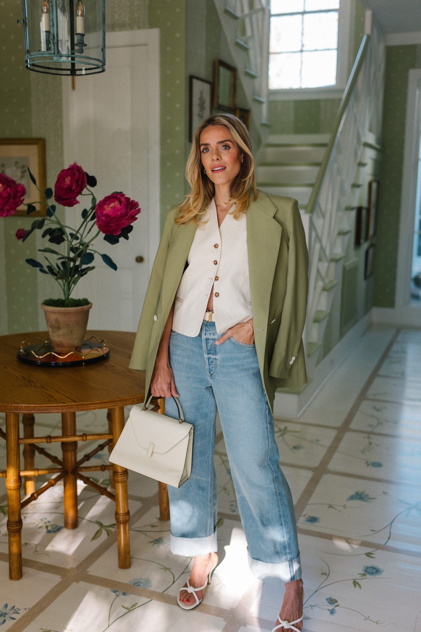 blue jeans white heels cream vest green blazer