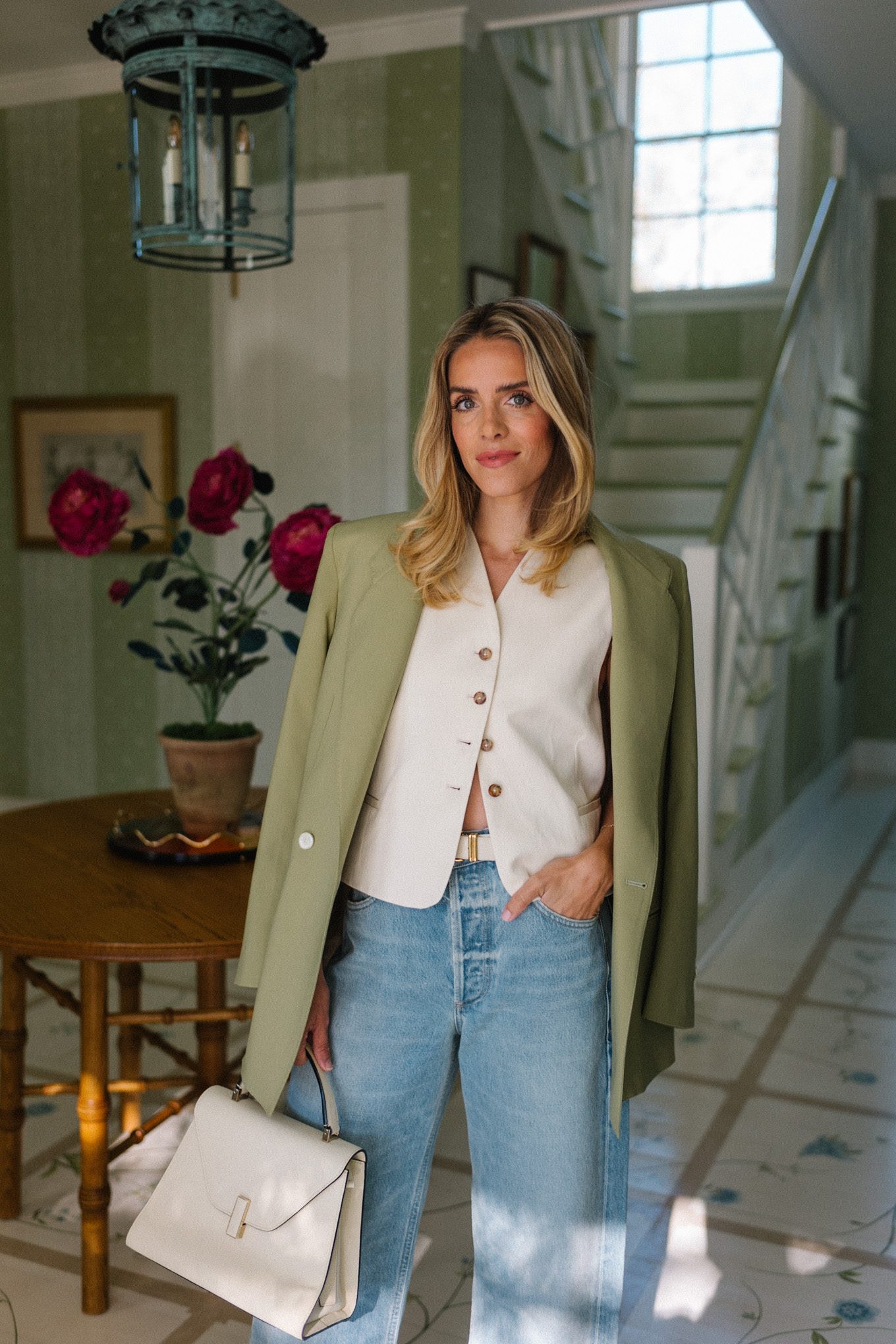 blue jeans white heels cream vest green blazer