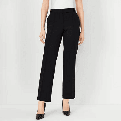 petite model wears straight pants with tab waist detail