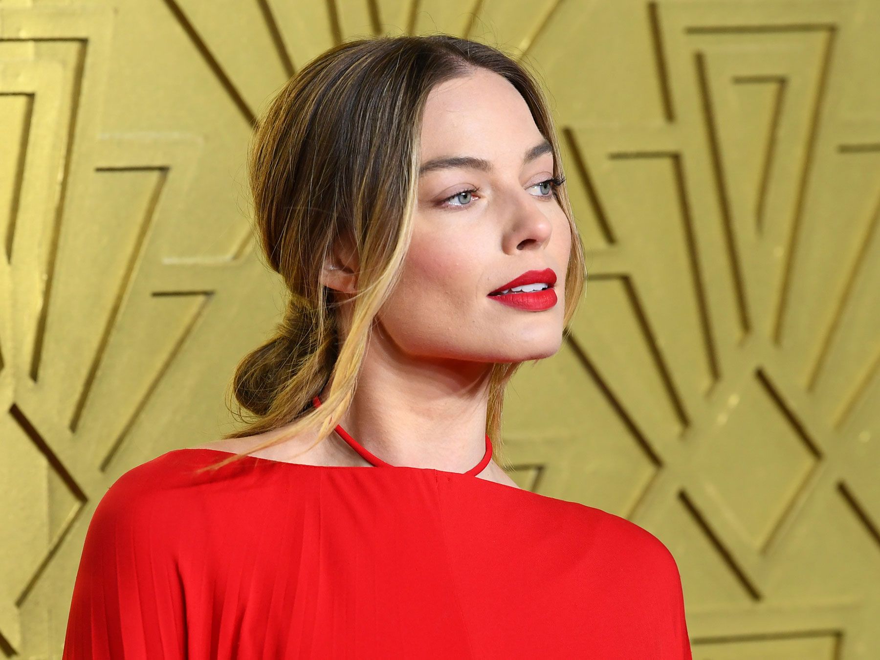 Margot Robbie’s Backless Caped Gown Deserves to Be Seen From Every Angle