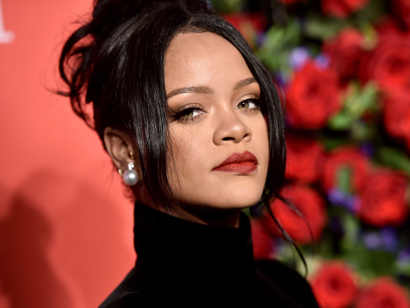 Rihanna Just Wore a Catsuit and Strappy Stilettos in the New Super Bowl Trailer