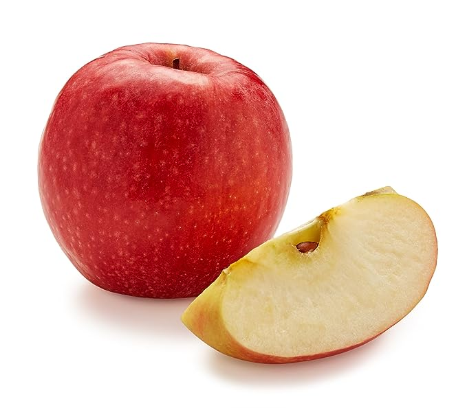 pink lady apples on a table