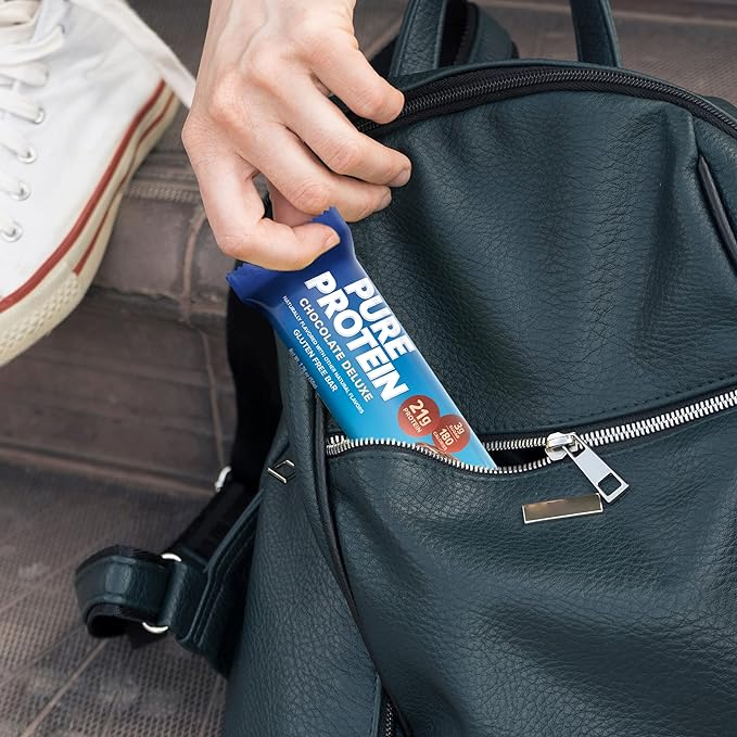 putting a pure protein bar in a backpack