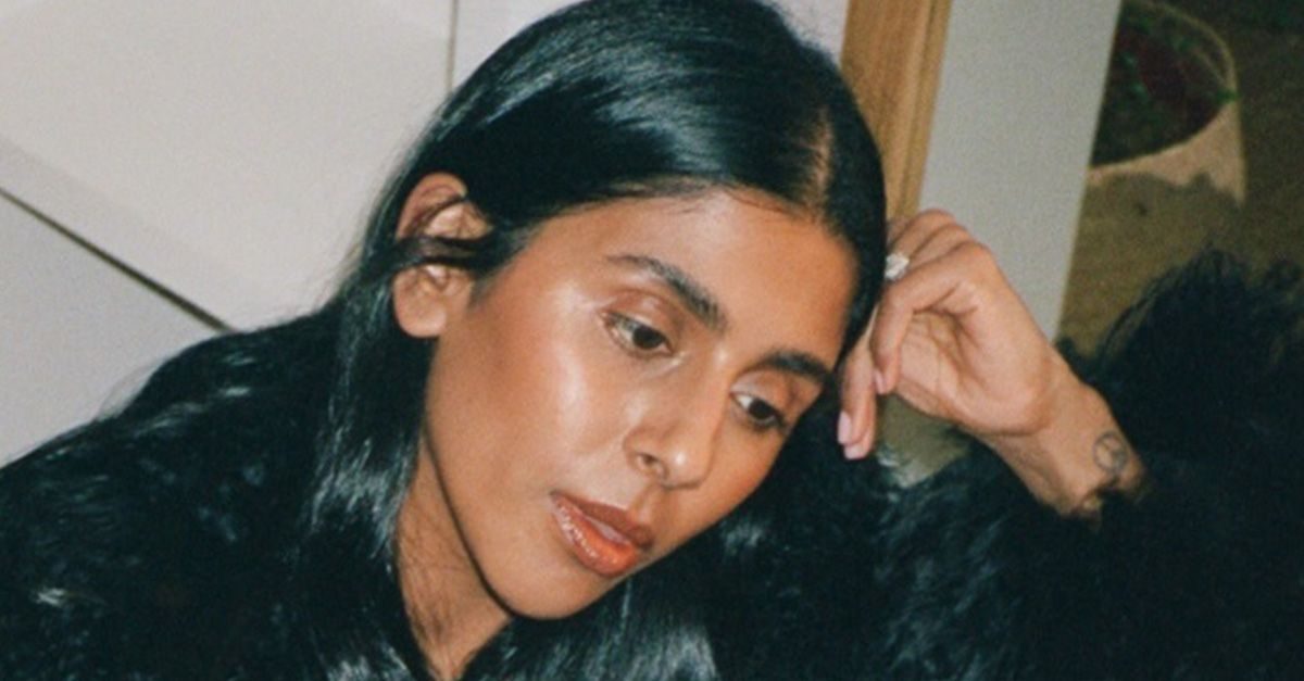 The Coat Trend to Wear With Jeans in Winter 2025